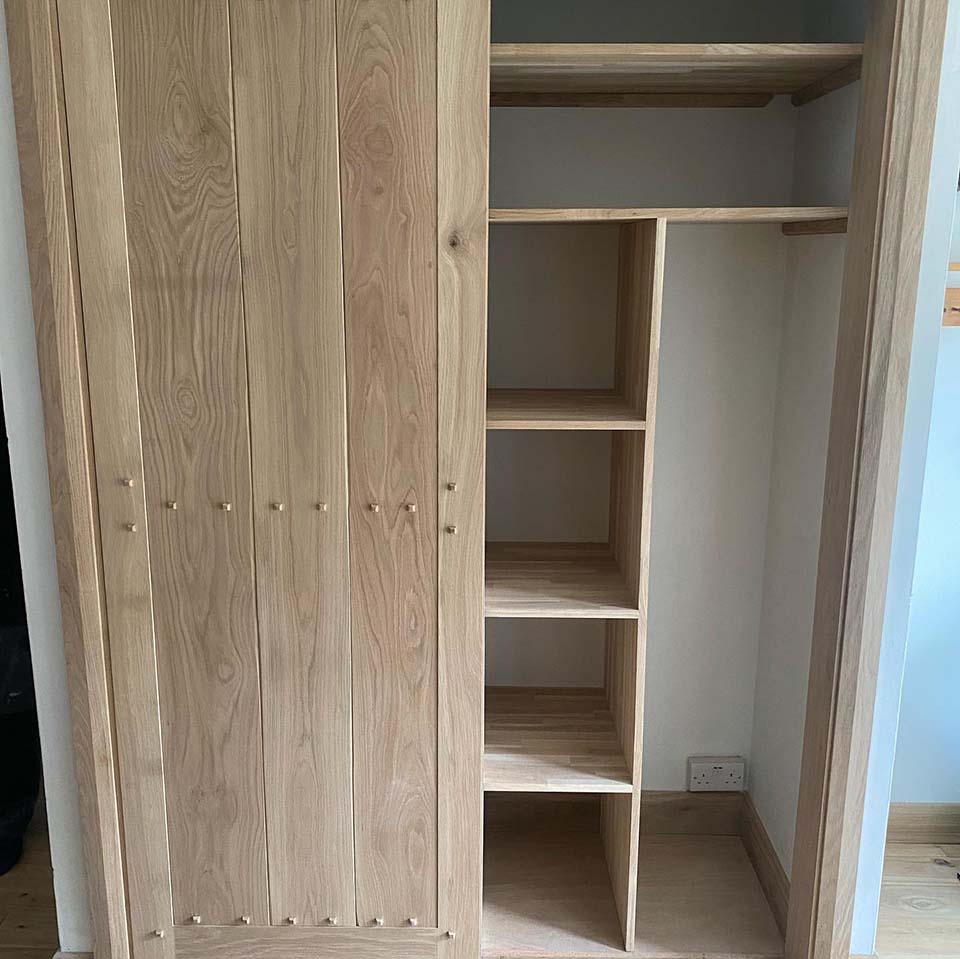 wooden built-in wardrobe with shelves